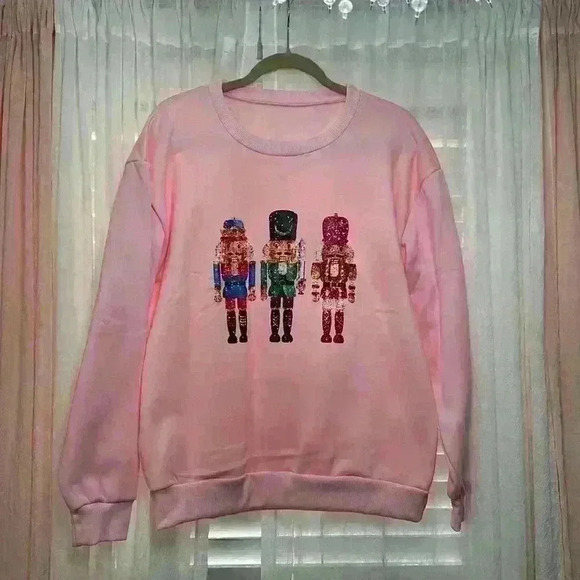 Tops - NWOT Nutcracker Christmas Sweatshirt Medium but will fit a Large item# 7K
